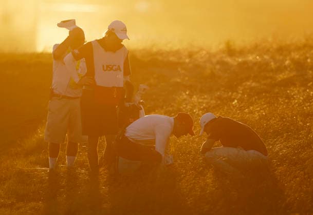 Course officials work with Matt Fitzpatrick of England on a ball drop in the rough on the 18th hole during the third round of the 126th U.S. Open Golf Championship at Shinnecock Hills Golf Club in Southampton, NY, on Saturday, June 20, 2026.  NYC20260620839 JOHNxANGELILLO