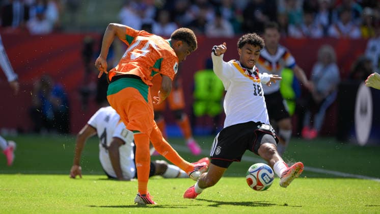 June 20, 2026, Toronto, Ontario, Canada: A shot by Amad Diallo ( 15) of CÃ te d Ivoire is blocked by Nathaniel Brown ( 18) of Germany during the 2026 FIFA World Cup, WM, Weltmeisterschaft, Fussball game between Germany and CÃ te d Ivoire at Toronto Stadium. Sports News - June 20, 2026  - ZUMAv136 20260620_zsp_v136_056 Copyright: xJeffxVoganx
