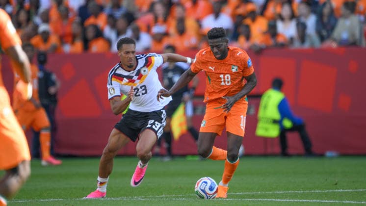 June 20, 2026, Toronto, Ontario, Canada: Ibrahim SangarÃ ( 18) of CÃ te d Ivoire is pursued by Felix Nmecha ( 23) of Germany during the 2026 FIFA World Cup, WM, Weltmeisterschaft, Fussball game between Germany and CÃ te d Ivoire at Toronto Stadium. Sports News - June 20, 2026  - ZUMAv136 20260620_zsp_v136_068 Copyright: xJeffxVoganx