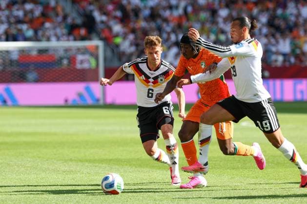 in a one-on-one duel, action, with Joshua Kimmich 6 Germany, Yan Diomande 11 Ivory Coast, Leroy Sané 19 Germany, Germany vs. Ivory Coast, soccer, FIFA, 2026 World Cup, group stage, June 20, 2026, Toronto, Ontario, Canada,detected_source_language Copyright: xkolbert-press ChristianxKolbertx