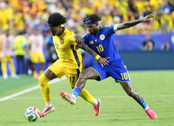 (260621) -- KANSAS CITY, June 21, 2026 -- Leandro Bacuna (R) of Curacao vies with Angelo Preciado of Ecuador during the group E match between Ecuador and Curacao at the FIFA World Cup, WM, Weltmeisterschaft, Fussball 2026 at Kansas City Stadium in Kansas City, the United States, June 20, 2026. ) (SP)U.S.-KANSAS CITY-FOOTBALL-FIFA WORLD CUP-GROUP E-ECU VS CUW DuxYu 