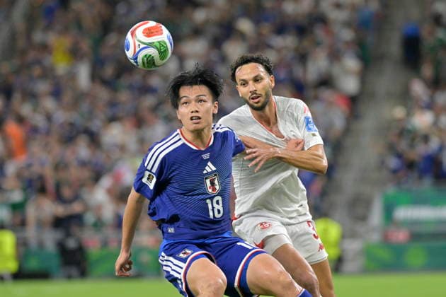 FIFA World Cup, WM, Weltmeisterschaft, Fussball 2026 - Group F - Tunisia vs. Japan Montassar Talbi (R) of Tunisia vies for the ball with Ayase Ueda (L) of Japan during the 2026 FIFA World Cup group F soccer match between Tunisia and Japan at BBVA Stadium in Monterrey, Mexico, 20 June 2026. Monterrey Mexico  Copyright: xMiguelxSierrax