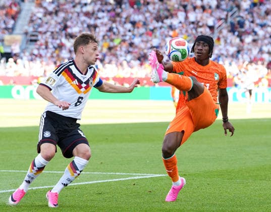 Joshua Kimmich, Germany, 6, and Yan Diomande, Ivory Coast, 11, CAN, FIFA World Cup, Germany vs. Ivory Coast, Toronto, June 20, 2026, CAN, FIFA World Cup, Germany vs. Ivory Coast, Toronto, June 20, 2026, Toronto,detected_source_language Copyright: xEibner-Pressefoto ScottxColemanx EP_SCN