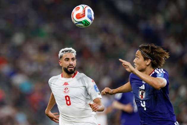 FIFA World Cup, WM, Weltmeisterschaft, Fussball 2026 - Group F - Tunisia vs. Japan Elias Saad (L) of Tunisia in action against Ko Itakura (R) of Japan during the 2026 FIFA World Cup Group F soccer match between Tunisia and Japan at the at BBVA stadium in Monterrey, Mexico, 20 June 2026. Monterrey Mexico  Copyright: xSashenkaxGutiérrezx