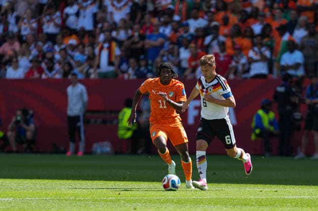 Ivory Coast vs Germany FIFA World Cup, WM, Weltmeisterschaft, Fussball Group G Match Yan Diomande 11 of Ivory Coast and Joshua Kimmich 06 of Germany battle for the ball during the 2026 FIFA World Cup Group E match between Germany and Ivory Coast at Toronto Stadium. on June 20, 2026 in Toronto, Canada. (Photo by Leonardo Ramirez Eyepix Group) Copyright: xLeonardoxRamirezx xEyepixxGroupx LR20062026-06151
