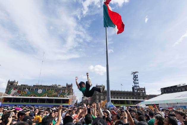 Germany Vs Ivory Coast Fan Fest At The Zocalo In Mexico City Supporters and fans of various nationalities watch the 2026 FIFA World Cup, WM, Weltmeisterschaft, Fussball match between Germany and Ivory Coast at the Fan Fest set up in the Zocalo in Mexico City, Mexico, on June 20, 2026. Attendees celebrate Germany s 2-1 victory in the Group E match while participating in activities organized for fans throughout the tournament. Mexico City Mexico  Copyright: xCristianxLeyvax originalFilename:leyva-notitle260620_np2Zp.jpg