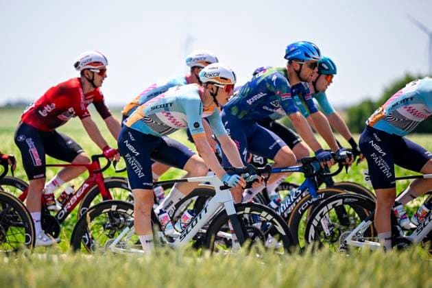 Baloise Belgium Tour 2026 Stage 5 HOEILAART, BELGIUM - JUNE 21 : Askey Lewis (GBR) of NSN Cycling Team in action during stage 5 of the 95th edition of Baloise Tour of Belgium an UCI ProSeries 2.Pro cycling road race stage for Men Elite of 183.6 km with start in Gingelom and finish in Hoeilaart on June 21, 2026 in Hoeilaart, Belgium, 21 06 2026 ( Motordriver Stephan Boone - Hoeilaart Belgium  Copyright: xTomasxSiskx