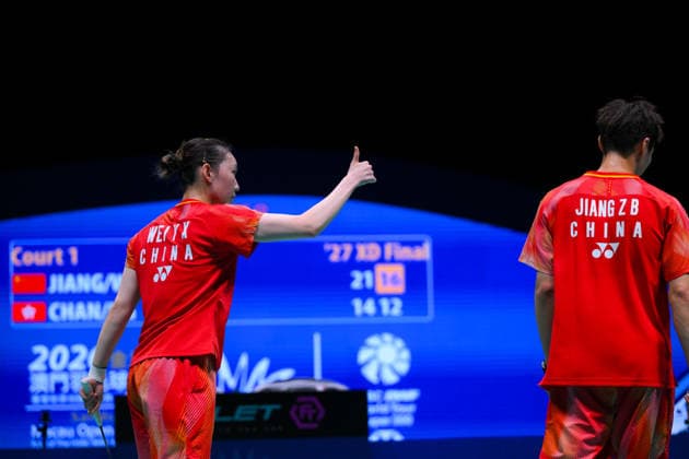 (260621) -- MACAO, June 21, 2026 -- Jiang Zhenbang Wei Yaxin (L) of China celebrate scoring during the mixed doubles final against Chan Yin Chak Ng Tsz Yau of China s Hong Kong at Macao Open badminton tournament 2026 in Macao, south China, June 21, 2026. ) (SP)CHINA-MACAO-BADMINTON-MACAO OPEN 2026-MIXED DOUBLES FINAL (CN) CheongxKamxKa 