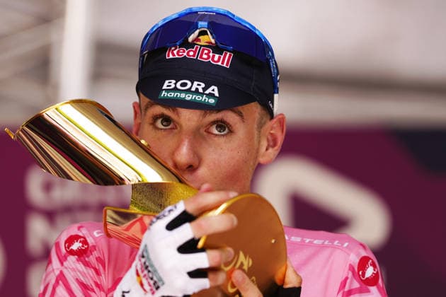 The pink jersey Italy s Lorenzo Mark Finn of Red Bull - Bora - Hansgrohe Rookies first-place celebrate on the podium after the Stage 8 of the Giro Next Gen 2026 Individual Time Trial, from Villa Sant Angelo to L Aquila, Italy, Sunday, June 21, 2026.  Copyright: xFabioxFerrari LaPressex