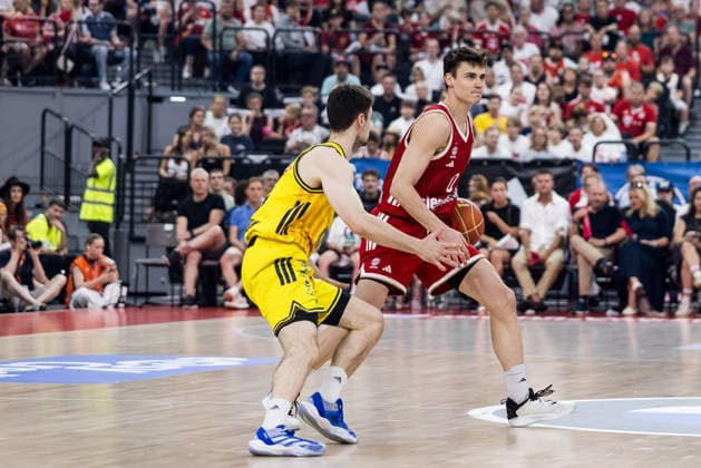 MUNICH, GERMANY - JUNE 21: Neno Dimitrijevic (FC Bayern Muenchen, 0) controls the ball against Jonas Mattisseck (Alba Berlin, 9) during the easyCredit Basketball Bundesliga Playoffs Final Game 5 match between FC Bayern Muenchen vs. Alba Berlin at SAP Garden on June 21, 2026 in Munich, Germany. Bavaria Germany Copyright: xSteffiexWunderlx