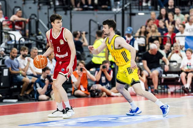 MUNICH, GERMANY - JUNE 21: Neno Dimitrijevic (FC Bayern Muenchen, 0) controls the ball against Jonas Mattisseck (Alba Berlin, 9) during the easyCredit Basketball Bundesliga Playoffs Final Game 5 match between FC Bayern Muenchen vs. Alba Berlin at SAP Garden on June 21, 2026 in Munich, Germany. Bavaria Germany Copyright: xSteffiexWunderlx