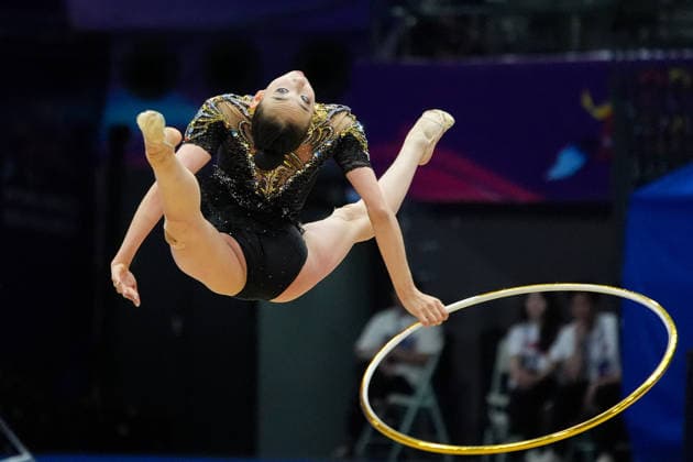 (260621) -- BEIJING, June 21, 2026 -- Wang Qi of China competes during the Individual Hoop final at the 2026 Rhythmic gymnastics, Rhythmische Sportgymnastik, RSG World Challenge Cup Beijing in Beijing, China, June 21, 2026. ) (SP)CHINA-BEIJING-RHYTHMIC GYMNASTICS-WORLD CHALLENGE CUP(CN) XiexHan 