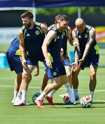 Grant Hanley of Scotland ,Andy Robertson of Scotland and Lyndon Dykes of Scotland Scotland Training and press conference, PK, Pressekonferenz 2026 FIFA World Cup, WM, Weltmeisterschaft, Fussball Football, Atrium Health Performance Park, Charlotte, USA - 21 Jun 2026Charlotte Atrium Health Performance Park United States of America EDITORIAL USE ONLY No use with unauthorised audio, video, data, fixture lists, club league logos or live services. Online in-match use limited to 120 images, no video emulation. No use in betting, games or single club league player publications.  Copyright: xMichaelxZemanek Shutterstockx 16928934cg