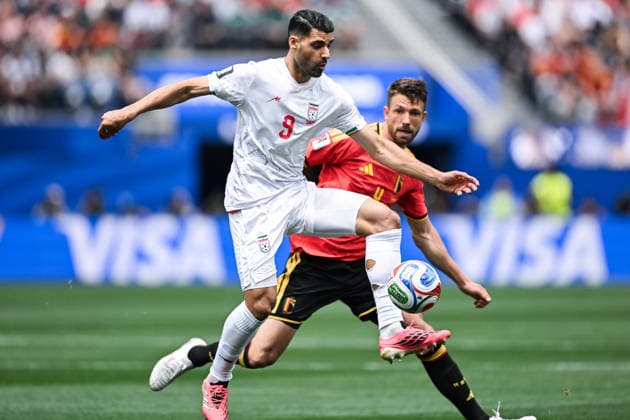 Mehdi Taremi of IR Iran (L) controls the ball under pressure from Brandon Mechele of Belgium (R) during a FIFA Men’s World Cup 2026 Group Stage football match between Belgium and Iran at Los Angeles Stadium, in Inglewood on June 21th 2026 (Photo by Nayra Halm SPP)  Copyright: xNayraxHalm SPPx Sportspressphoto_SPR172776