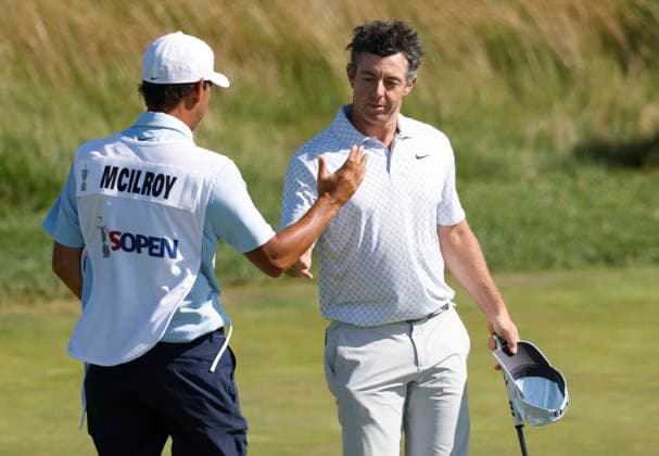 Rory McIlroy of Northern Ireland is congratulated by his caddie Harry Diamond after his final round of the 126th U.S. Open Golf Championship at Shinnecock Hills Golf Club in Southampton, NY, on Sunday, June 21, 2026.  NYC20260621823 JOHNxANGELILLO