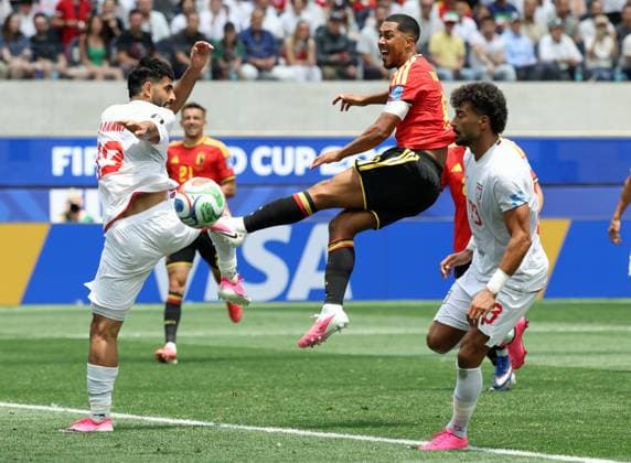 Iran s Hossein Kanaanizadegan, Belgium s Youri Tielemans and Iran s Ramin Rezaeian fight for the ball during a soccer game between Belgian national team, Nationalteam Red Devils and Iran, on Sunday 21 June 2026, at the SoFi stadium in Los Angeles, the second game in the group stage of the FIFA World Cup, WM, Weltmeisterschaft, Fussball 2026 in the United States of America. The Diables Rouges - Rode Duivels were drawn into Group G. BRUNOxFAHY  x178661322x