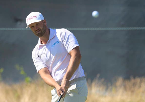 Wyndham Clark chips to the 6th green during the final round of the 126th U.S. Open Golf Championship at Shinnecock Hills Golf Club in Southampton, NY, on Sunday, June 21, 2026.  NYC20260621837 COREYxSIPKIN