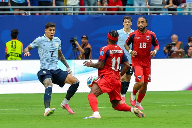 MIAMI GARDENS, FL - JUNE 21: Garry Rodrigues 11 of Cabo Verde and Mathias Olivera 16 of Uruguay battle for a ball during a FIFA World Cup, WM, Weltmeisterschaft, Fussball 2026 Group H match between Uruguay and Cabo Verde on June 21,2026 at Miami Stadium, in Miami Gardens, Fla.(Photo by Chris Arjoon Icon Sportswire) SOCCER: JUN 21 FIFA World Cup 26 Group H - Uruguay vs Cabo Verde EDITORIAL USE ONLY Icon26062100100009