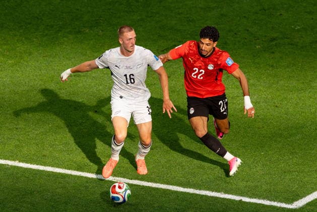 June 21, 2026, Vancouver, Bc, CANADA: Egypt s Omar Marmoush (22) challenges New Zealand s Finn Surman (16) during the first half of a World Cup Group G soccer match, in Vancouver, on Sunday, June 21, 2026. Canada News - June 21, 2026  - ZUMAc35_ 20260621_zaf_c35_159 Copyright: xTimothyxMatweyx