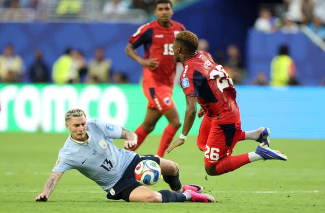 (260622) -- MIAMI, June 22, 2026 -- Guillermo Varela (L) of Uruguay vies with Helio Varela (R) of Cape Verde during the group H match between Uruguay and Cape Verde at the 2026 FIFA World Cup, WM, Weltmeisterschaft, Fussball at Miami Stadium, Miami, the United States, June 21, 2026. ) (SP)U.S.-MIAMI-FOOTBALL-FIFA WORLD CUP-GROUP H-URU VS CPV ZhangxChen 