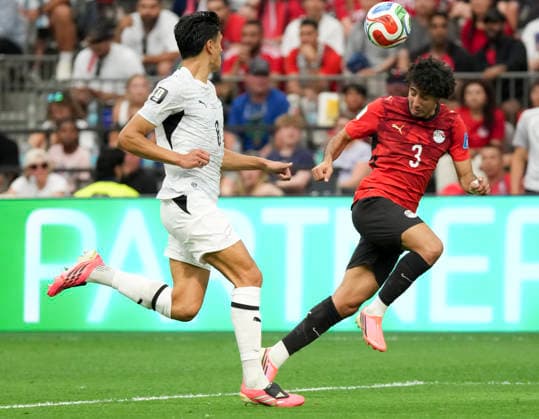(260622) -- VANCOUVER, June 22, 2026 -- Mohamed Hany (R) of Egypt heads the ball during a group G match between New Zealand and Egypt at the 2026 FIFA World Cup, WM, Weltmeisterschaft, Fussball at BC Place Vancouver in Vancouver, Canada, June 21, 2026. ) (SP)CANADA-VANCOUVER-FOOTBALL-FIFA WORLD CUP-GROUP G-NZL VS EGY MengxYongmin 