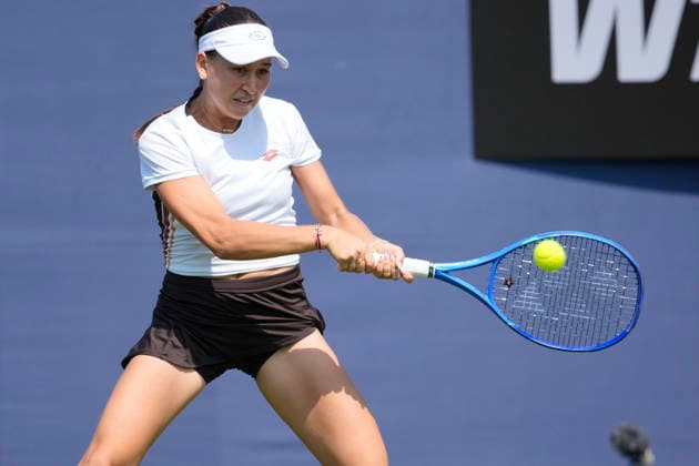 Lexus Eastbourne Open - Day One Kamilla Rakhimova competes during her match at the 2026 Lexus Eastbourne Open Women s tennis tournament at the Devonshire Park Lawn Tennis Club in Eastbourne, Great Britain, on June 22, 2026. Eastbourne United Kingdom  Copyright: xOwenxHammondx originalFilename:hammond-2026lexu260622_npZMu.jpg