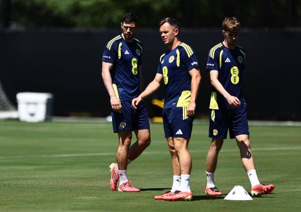 Scott McKenna of Scotland ,Lawrence Shankland of Scotland and Tyler Fletcher of Scotland Scotland Training and press conference, PK, Pressekonferenz 2026 FIFA World Cup, WM, Weltmeisterschaft, Fussball Football, Atrium Health Performance Park, Charlotte, USA - 22 Jun 2026Charlotte Atrium Health Performance Park United States of America EDITORIAL USE ONLY No use with unauthorised audio, video, data, fixture lists, club league logos or live services. Online in-match use limited to 120 images, no video emulation. No use in betting, games or single club league player publications.  Copyright: xMichaelxZemanek Shutterstockx 16949461d