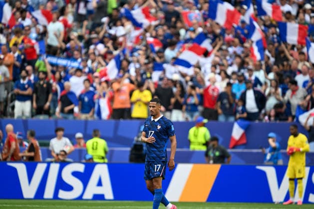 PHILADELPHIA, PA - JUNE 22: William Saliba 17 of France looks on as France fans celebrate during the FIFA World Cup, WM, Weltmeisterschaft, Fussball 2026 Group I match between France and Iraq on June 22nd, 2026 at Philadelphia Stadium in Philadelphia, PA.(Photo by Terence Lewis Icon Sportswire) SOCCER: JUN 22 FIFA World Cup 26 Group I - France vs Iraq EDITORIAL USE ONLY Icon260622010