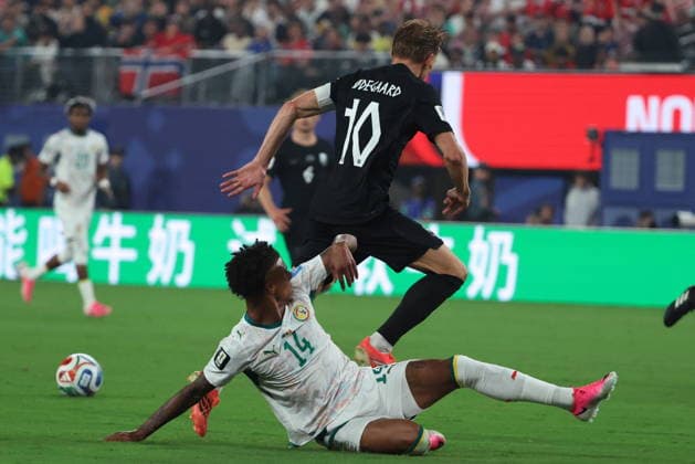 FIFA World Cup, WM, Weltmeisterschaft, Fussball 2026 - Group I - Norway vs Senegal Ismail Jakobs of Senegal (L) in action against Martin Odegaard of Norway (R) during the FIFA World Cup 2026 group stage match Senegal against Norway, in East Rutherford, New Jersey, USA, 22 June 2026. East Rutherford United States  Copyright: xOLGAxFEDOROVAx