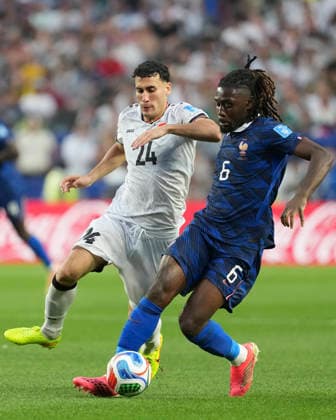 (260623) -- PHILADELPHIA, June 23, 2026 -- Manu Kone (R) of France vies with Zaid Ismael of Iraq during the group I match between France and Iraq at the 2026 FIFA World Cup, WM, Weltmeisterschaft, Fussball at Philadelphia Stadium in Philadelphia, the United States, June 22, 2026. ) (SP)U.S.-PHILADELPHIA-FOOTBALL-FIFA WORLD CUP-GROUP I-FRA VS IRQ LuixSiuxWai 