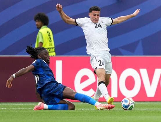 (260623) -- PHILADELPHIA, June 23, 2026 -- Manu Kone (L) of France vies with Zaid Ismael of Iraq during the group I match between France and Iraq at the 2026 FIFA World Cup, WM, Weltmeisterschaft, Fussball at Philadelphia Stadium in Philadelphia, the United States, June 22, 2026. ) (SP)U.S.-PHILADELPHIA-FOOTBALL-FIFA WORLD CUP-GROUP I-FRA VS IRQ LuixSiuxWai 