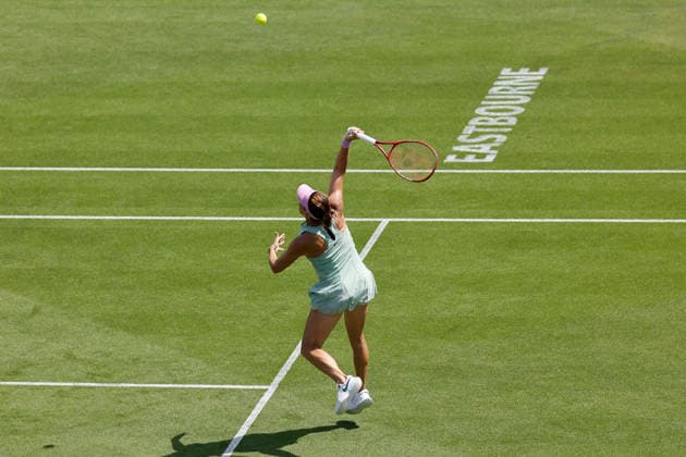 RECORD DATE NOT STATED 23rd June 2026; Devonshire Park Lawn Tennis Club, Eastbourne, East Sussex, England; Lexus Eastbourne Open Tennis, Day Three; Tatjana Maria (GER) plays an overhead shot against Jasmine Paolini (ITA) HongboxChen
