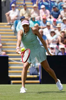RECORD DATE NOT STATED 23rd June 2026; Devonshire Park Lawn Tennis Club, Eastbourne, East Sussex, England; Lexus Eastbourne Open Tennis, Day Three; Tatjana Maria (GER) plays a backhand shot against Jasmine Paolini (ITA) HongboxChen