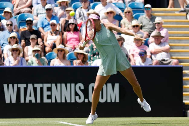 RECORD DATE NOT STATED 23rd June 2026; Devonshire Park Lawn Tennis Club, Eastbourne, East Sussex, England; Lexus Eastbourne Open Tennis, Day Three; Tatjana Maria (GER) plays a backhand shot against Jasmine Paolini (ITA) HongboxChen