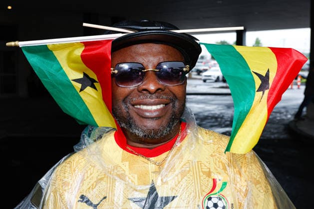 June 23, 2026; Foxborough, Massachusetts, USA; A Ghana supporter wears two flags ahead of in a FIFA World Cup, WM, Weltmeisterschaft, Fussball 2026 Group L match between England and Ghana at Boston Stadium. (c) CSM FIFA World Cup 2026: England Vs Ghana JUN 23  - ZUMAc04_ 20260623_zma_c04_008 Copyright: xBurtxGranofskyx