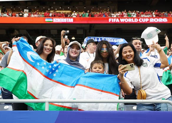 Fan s of Uzbekistan show their support before the start of a FIFA World Cup, WM, Weltmeisterschaft, Fussball match against Portugal at Houston Stadium in Houston, Texas, on Tuesday, June 23, 2026.  HOU20260623906 CHRISTIANxBRUNSKILL