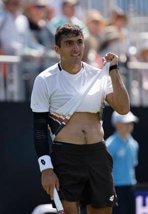 RECORD DATE NOT STATED 23rd June 2026; Devonshire Park Lawn Tennis Club, Eastbourne, East Sussex, England; Lexus Eastbourne Open Tennis, Day Three; Roman Andres Burruchaga (ARG) pulls his shirt after losing a point to Arthur Fery (GBR) HongboxChen