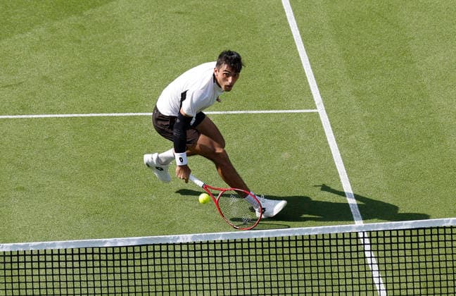 RECORD DATE NOT STATED 23rd June 2026; Devonshire Park Lawn Tennis Club, Eastbourne, East Sussex, England; Lexus Eastbourne Open Tennis, Day Three; Roman Andres Burruchaga (ARG) plays a backhand shot against Arthur Fery (GBR) HongboxChen