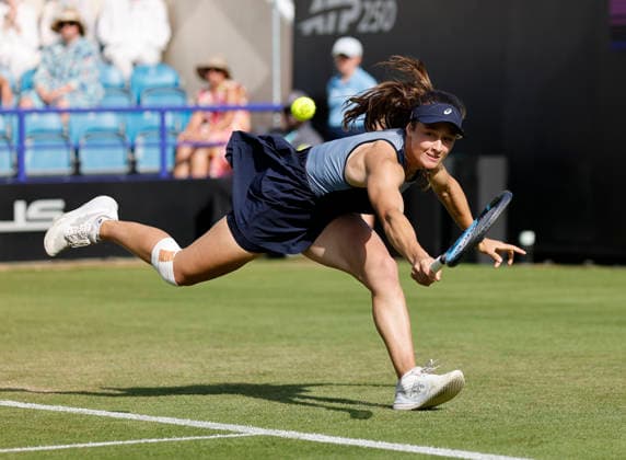 RECORD DATE NOT STATED 23rd June 2026; Devonshire Park Lawn Tennis Club, Eastbourne, East Sussex, England; Lexus Eastbourne Open Tennis, Day Three; Zeynep Sonmez (TUR) plays a backhand shot against Harriet Dart (GBR) HongboxChen