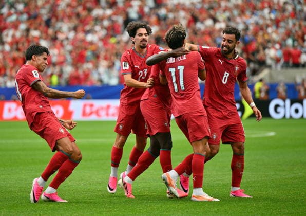 FIFA World Cup, WM, Weltmeisterschaft, Fussball 2026 - Group K - Portugal vs Uzbekistan Nuno Mendes of Portugal (C) celebrates with teammates after scoring the 2-0 during the FIFA World Cup 2026 group stage match Portugal against Uzbekistan, in Houston, USA, 23 June 2026. HOUSTON United States  Copyright: xSAMxWASSONx