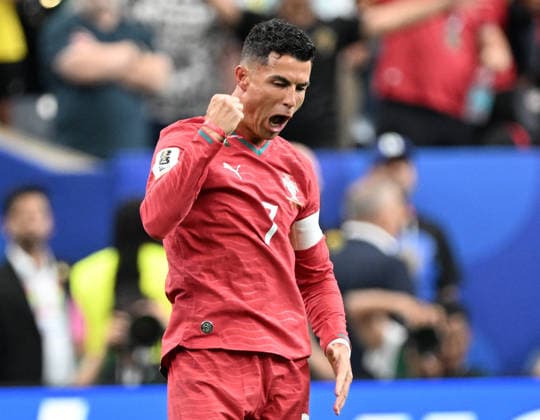 (260624) -- HOUSTON, June 24, 2026 -- Cristiano Ronaldo of Portugal celebrates scoring during the group K match between Portugal and Uzbekistan at the 2026 FIFA World Cup, WM, Weltmeisterschaft, Fussball at Houston Stadium in Houston, the United States, June 23, 2026. ) (SP)U.S.-HOUSTON-FOOTBALL-FIFA WORLD CUP-GROUP K-POR VS UZB XiaoxYijiu 