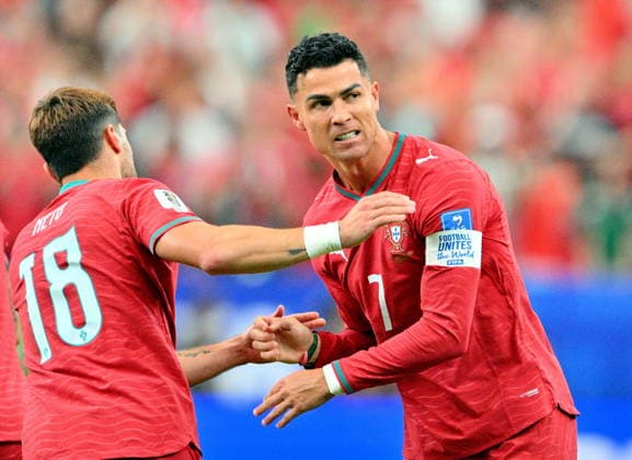 FIFA World Cup, WM, Weltmeisterschaft, Fussball 2026 - Group K - Portugal vs Uzbekistan Portugal s Cristiano Ronaldo (R) celebrates after scoring a goal with teammate Pedro Neto of during the FIFA World Cup 2026 group stage match Portugal against Uzbekistan, in Houston, USA, 23 June 2026. HOUSTON United States  Copyright: xSAMxWASSONx