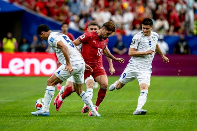 HOUSTON — Rustam Ashurmatov of Uzbekistan, Pedro Neto of Portugal, and Odiljon Xamrobekov of Uzbekistan during the 2026 World Cup at NRG Stadium on June 23, 2026, in Houston, United States. Photo by Stefan Koops, EYE4IMAGES, DeFodi Images,detected_source_language