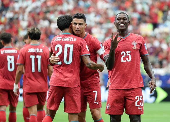 (260624) -- HOUSTON, June 24, 2026 -- Cristiano Ronaldo (2nd R), Nuno Mendes (1st R) and Joao Cancelo of Portugal celebrate scoring during the group K match between Portugal and Uzbekistan at the 2026 FIFA World Cup, WM, Weltmeisterschaft, Fussball at Houston Stadium in Houston, the United States, June 23, 2026. ) (SP)U.S.-HOUSTON-FOOTBALL-FIFA WORLD CUP-GROUP K-POR VS UZB LixMing 