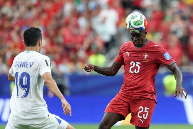 HOUSTON, TX - JUNE 23: Nuno Mendes 25 of Portugal heads the ball away from Azizjon Ganiev 19 of Uzbekistan during the FIFA World Cup, WM, Weltmeisterschaft, Fussball 2026 Group K match between Portugal and Uzbekistan on June 23, 2026, at Houston Stadium in Houston, Texas. (Photo by David Buono Icon Sportswire) SOCCER: JUN 23 FIFA World Cup 26 Group K - Portugal vs Uzbekistan EDITORIAL USE ONLY Icon260623062