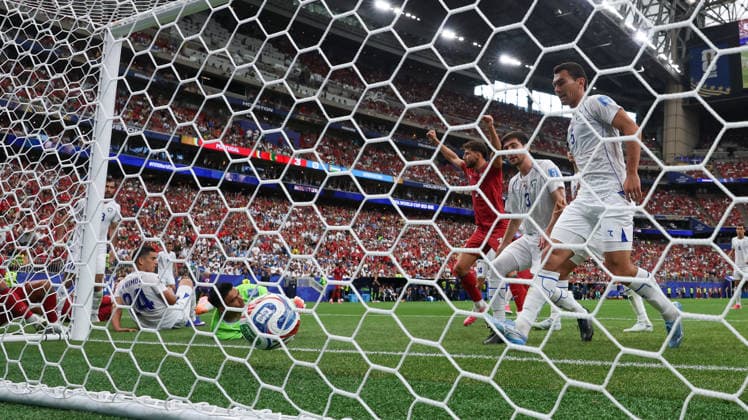 HOUSTON, TX - JUNE 23: Ruben Dias 3 of Portugal raises his arms as the ball crosses the goal line while Abduvohid Nematov 12 of Uzbekistan, Bekhruz Karimov 24 of Uzbekistan, Khojiakbar Alijonov 3 of Uzbekistan and Ruslam Ashurmatov 5 of Uzbekistan show their dejection during the FIFA World Cup, WM, Weltmeisterschaft, Fussball 2026 Group K match between Portugal and Uzbekistan on June 23, 2026, at Houston Stadium in Houston, Texas. (Photo by David Buono Icon Sportswire) SOCCER: JUN 23 FIFA World Cup 26 Group K - Portugal vs Uzbekistan EDITORIAL USE ONLY Icon260623070