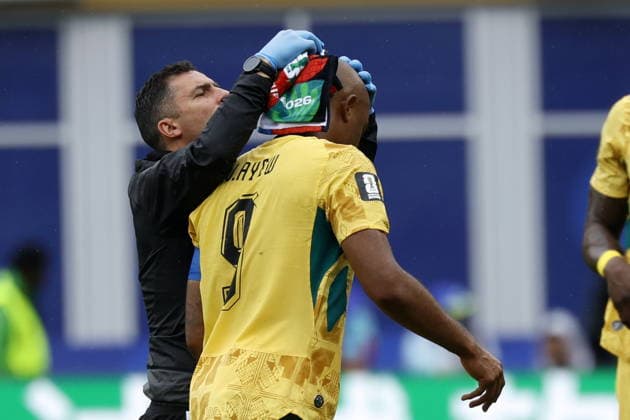 FIFA World Cup, WM, Weltmeisterschaft, Fussball 2026 - Group L - England vs Ghana Jordan Ayew of Ghana (R) receives medical attention during the FIFA World Cup 2026 group stage match England against Ghana, in Boston, Massachusetts, USA, 23 June 2026. Foxborough United States  Copyright: xGREGxM.xCOOPERx