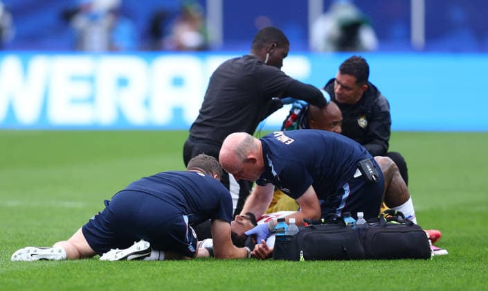 Foxborough, USA, 23rd June 2026. Reece James of England is examined by medical staff after clashing heads with Jordan Ayew of Ghana during the England vs Ghana FIFA World Cup, WM, Weltmeisterschaft, Fussball match at Gillette Stadium, Foxborough. Picture credit should read: Paul Terry Sportimage EDITORIAL USE ONLY. No use with unauthorised audio, video, data, fixture lists, club league logos or live services. Online in-match use limited to 120 images, no video emulation. No use in betting, games or single club league player publications. SPI_052_PT_Eng_Ghanax SPI-4840-0063