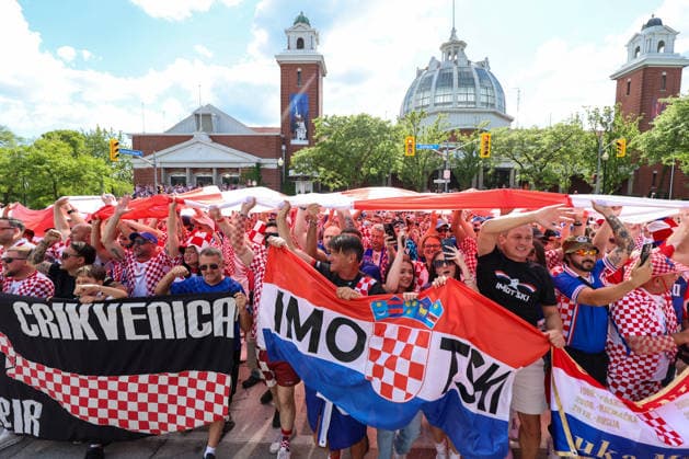 Toronto Croatia Flag Parade Thousands of Croatian fans pack Main Street as they carry a large Croatian flag during a Croatian parade before the FIFA World Cup, WM, Weltmeisterschaft, Fussball 2026 Group L match between Panama and Croatia on June 23, 2026 in Toronto, Ontario.  SanjinxStrukic PIXSELL