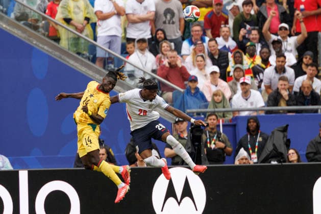 Ghana defender Gideon Mensah and England forward Noni Madueke in action during the first half of their FIFA World Cup, WM, Weltmeisterschaft, Fussball match at Gillette Stadium in Foxborough, Massachusetts, on Tuesday, June 23, 2026.  BOP20260623022 CJxGUNTHER